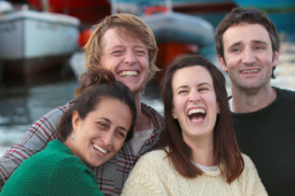 Four Adult English Students Laughing